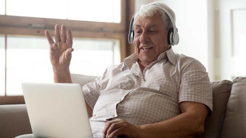 Older man on video call