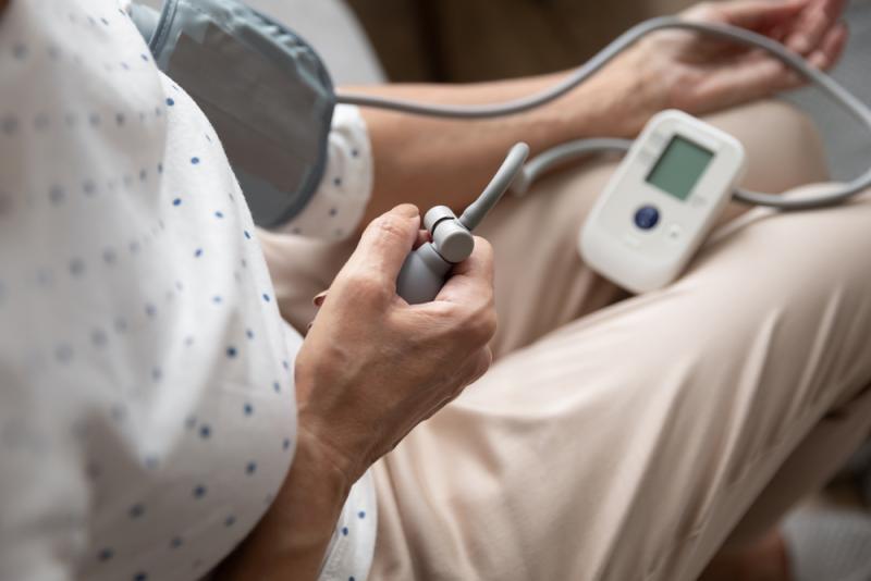 Person measuring blood pressure
