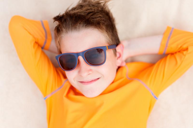 Young boy in sunglasses