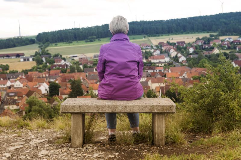 Older lady alone on bench